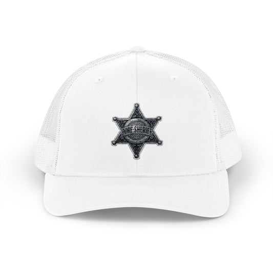 Snapback – Dorf-Sheriff