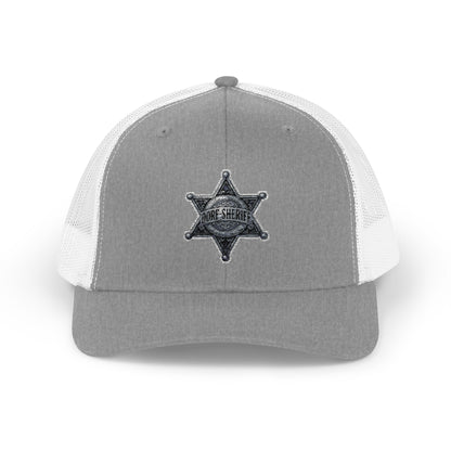 Snapback – Dorf-Sheriff