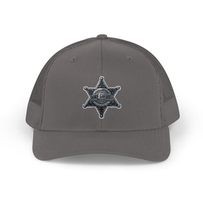 Snapback – Dorf-Sheriff