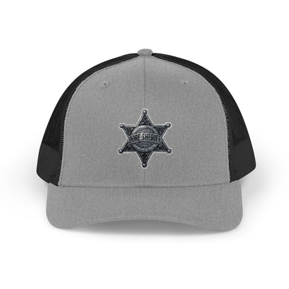 Snapback – Dorf-Sheriff