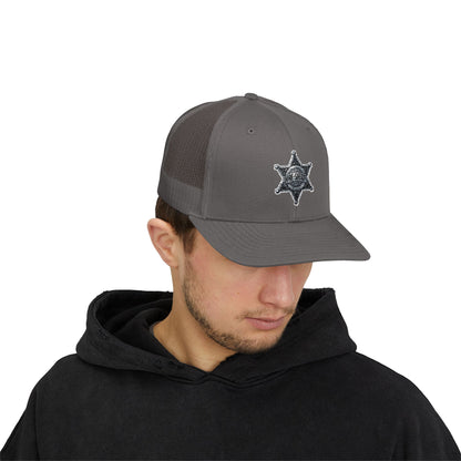 Snapback – Dorf-Sheriff